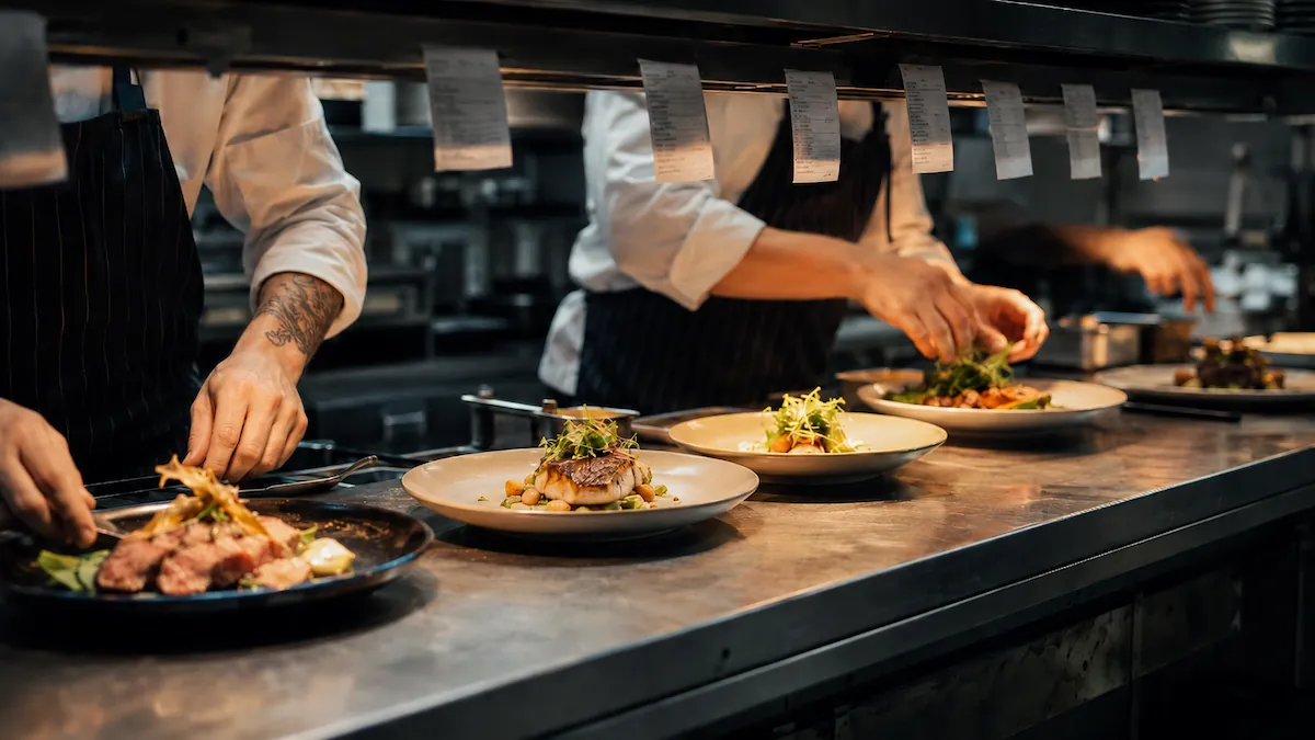 The Delivery Method team implementing the system for a restaurant